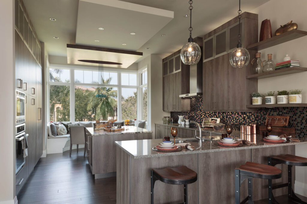 Contemporary coastal kitchen with cozy window seat created with Andersen 400 Series Picture Windows and 400 Series Casement Windows, bringing the beautiful outdoors in