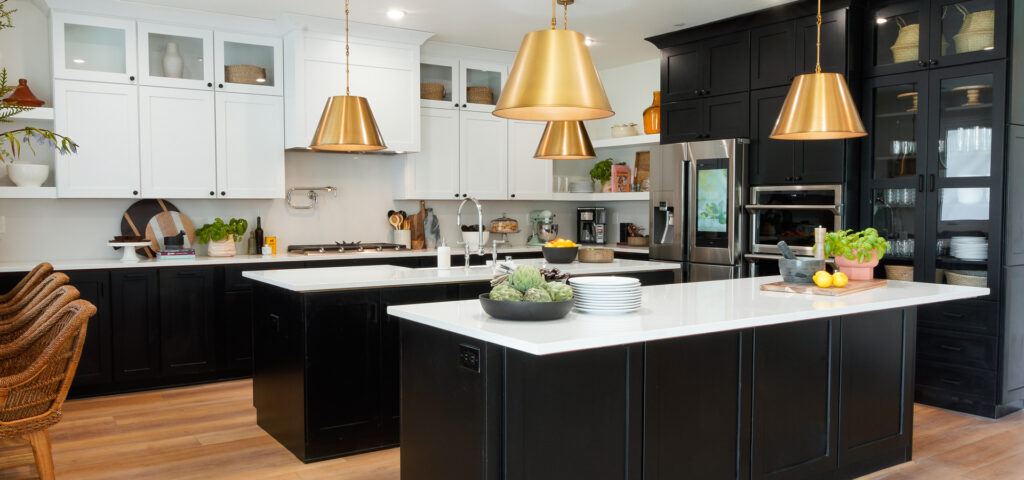 Black and white custom designed kitchen with brass accents by Starmark